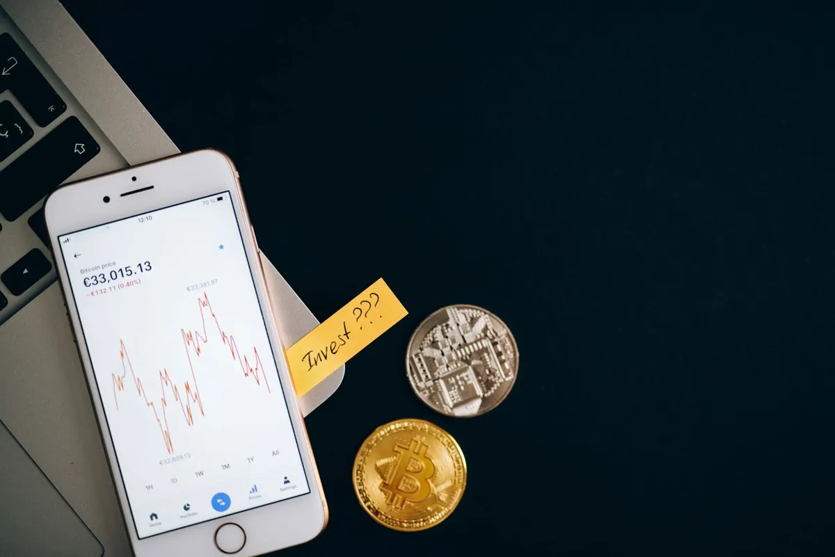 Modern building overlaid with digital tokens, representing tokenized real estate investing on the blockchain